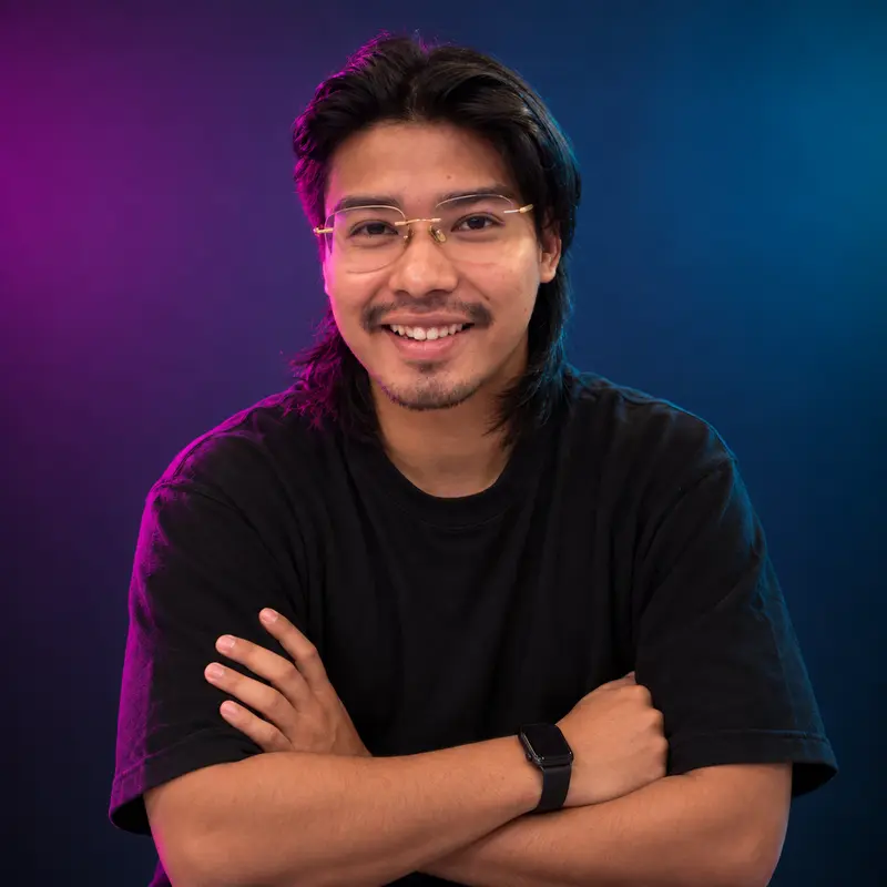 Joshua Basumatary, the maker of NowToolSpace, smiling with arms crossed